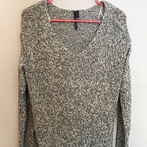 Long black and white sweater